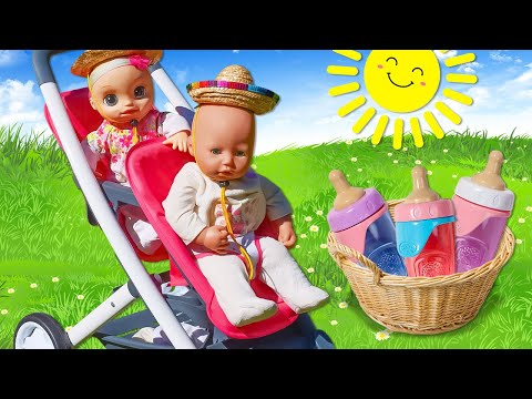 Baby Annabell doll and Baby Alive doll go on a picnic. Feeding baby dolls with toy food. Kids video.