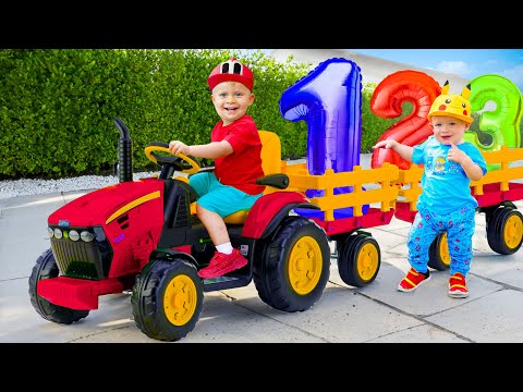 Belajar Angka dengan Oliver di atas sebuah Traktor