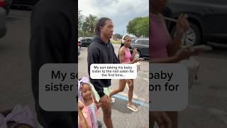 My son surprising his baby sister with her first
