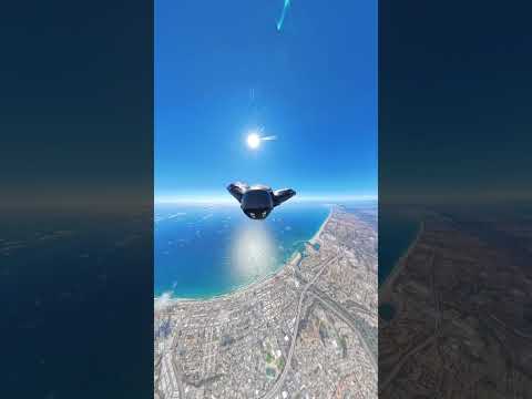 Wingsuit flying over Oceanside California