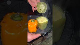 Making some scrambled egg stuffed peppers over the campfire