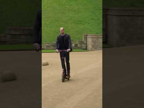 Prince William speeds through Windsor on scooter