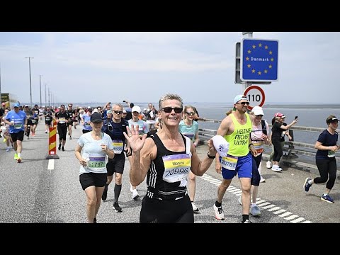 YouTube video thumbnail: Some 40,000 Runners Cross Europe’s Longest Bridge and Tunnel Link on Its 25th Anniversary