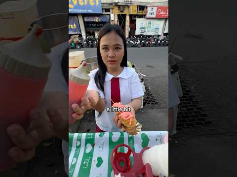 $0.55 pink corn dog 🌭 #philippines #streetfood
