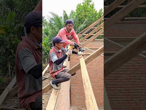 Senior builder teaches how to make it easier to install roof frame wood..