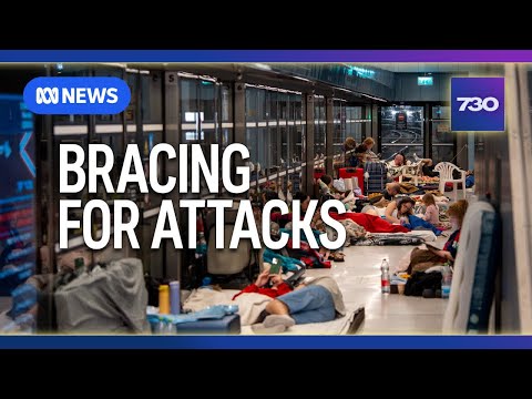 YouTube video thumbnail: Cities in Israel Grind to a Halt as Iranian Missiles Rain Down