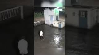 CCTV footage captured the moment a man and a lion came face to face.