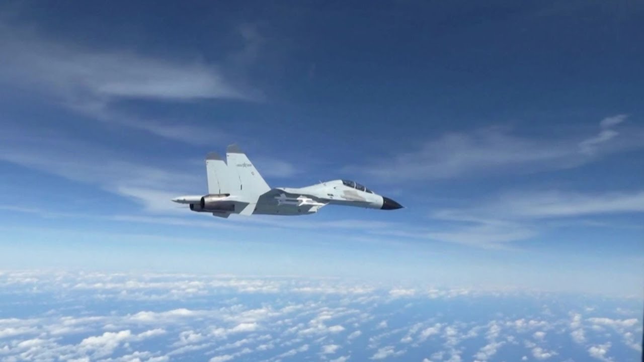 WATCH: Chinese fighter jet gets real close with US recon aircraft