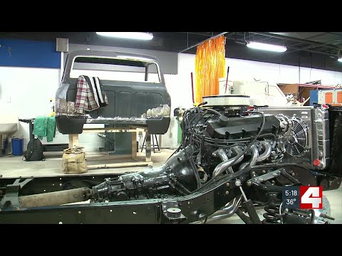 High school students rebuilding pickup truck