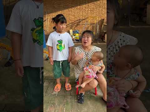 Having a cute baby at home is a lot of fun. Parent-child time. The baby who is forced to work is on