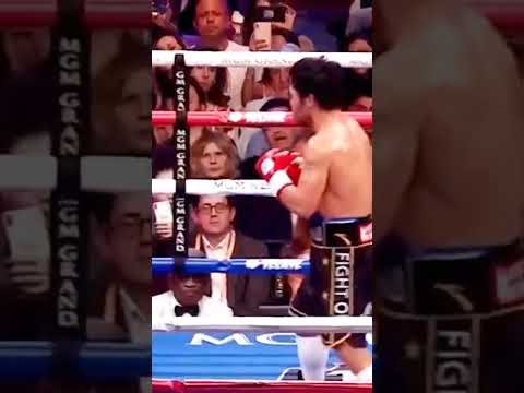 Broner is Holding Manny Pacquiao in the corner