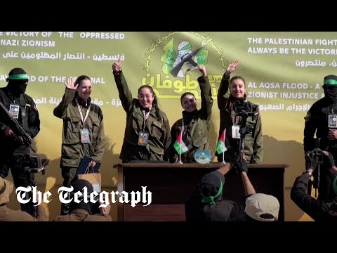 Moment Israeli hostages are paraded to crowd before being released by Hamas