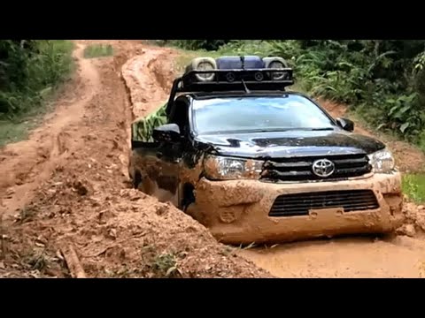 Mitsubishi Triton Toyota Hilux Mazda and Ford Ranger - 4x4 Pickup Truck Goods Carrier In Mud Route