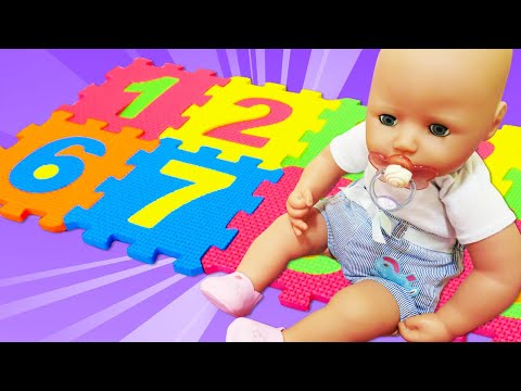 Baby Annabell doll plays with a big number puzzle for kids. Baby dolls videos for kids. Kids fun.