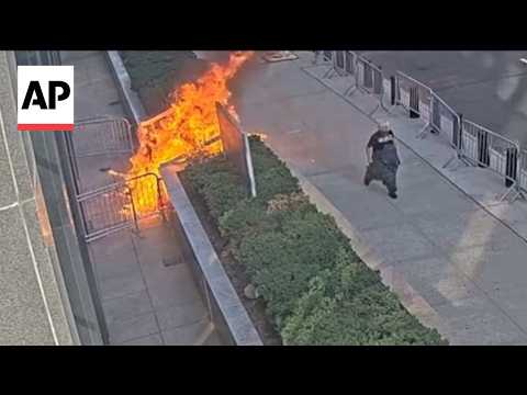Surveillance video shows fireworks and flames lit on New York federal building