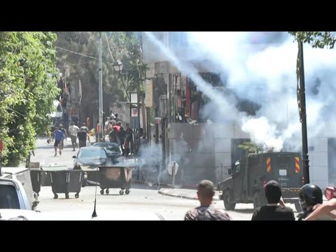 Israeli forces fire tear gas at Palestinians during Ramallah raid | AFP