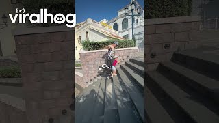 Dad's Method of Getting a Stroller Up Stairs || ViralHog