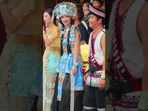 Shujie <strong>is</strong> so cute! She's trying to trip Brother Niu <strong>again</strong>! #MiaoEthnicFestival