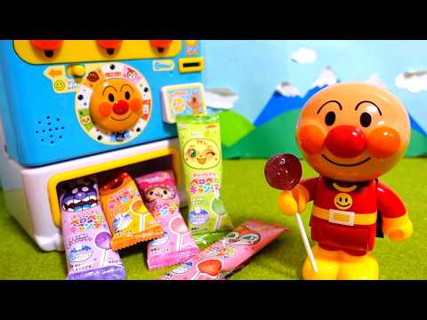 アンパンマンのおもちゃのおやつ自販機でペロペロキャンディーを買うよ♪おかいものごっこあそび