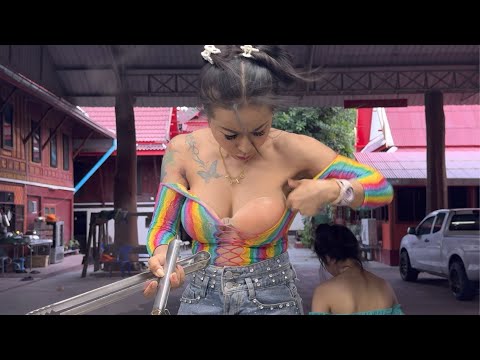 Hardworking Thai Lady Cooking Noodles 500 Blow Serve on Event Party -Thai Street Food