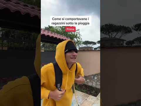 I RAGAZZINI SOTTO LA PIOGGIA.