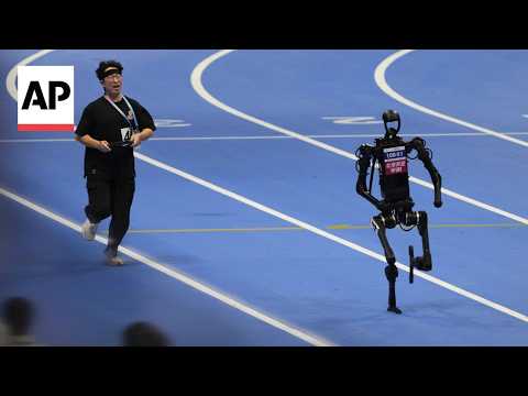 YouTube video thumbnail: AI Robots Compete in Track, Boxing and Soccer at China's Tournament