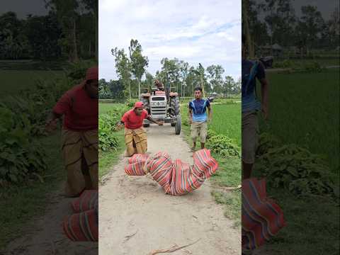 The boy jumped from two tractors.