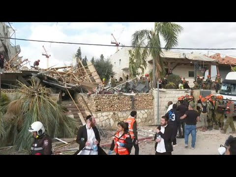 Aftermath of deadly Iran missile attack in Israel's Beit Shemesh | AFP