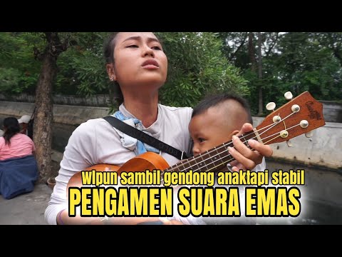 Pengamen suara merdu Wulan, walaupun sambil gendong tapi suaranya tetap stabil