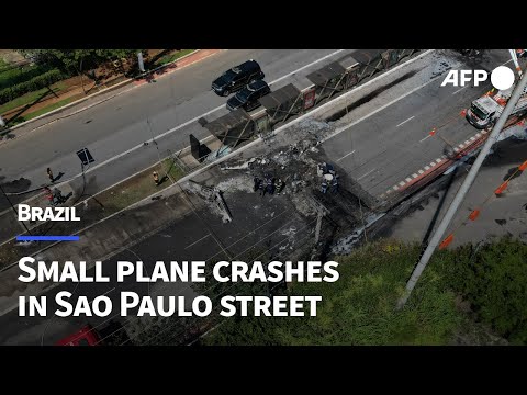 Small plane crashes into vehicles in Sao Paulo | AFP