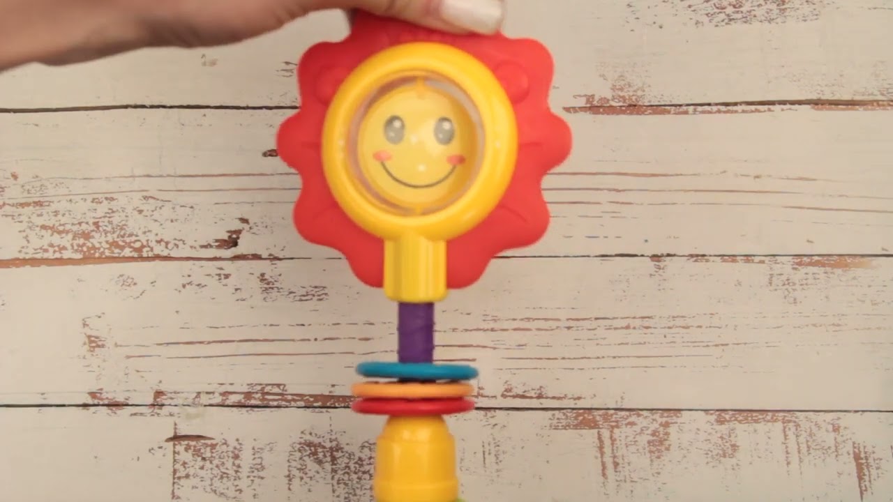 Погремушка-прорезыватель с трещоткой Солнышко - видео