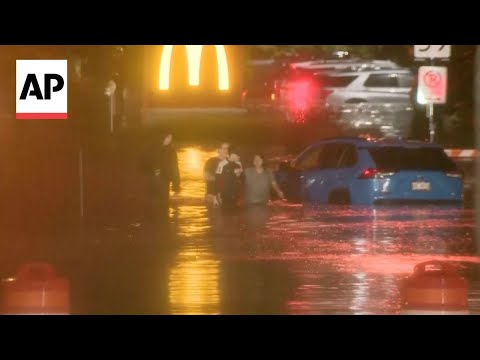 YouTube video thumbnail: Flooding in Milwaukee Cancels Wisconsin State Fair and Cuts Power