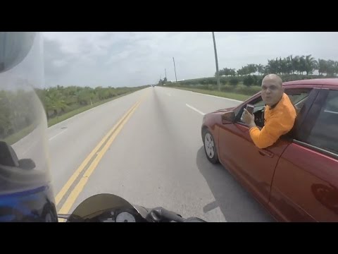 Car Tries to KILL Motorcyclist - Road Rage!