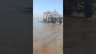 Tractor 🚜 stunts in canal Water #viralvideo #youtubeshorts #shorts