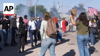 Federal agents fire chemicals toward protesters at Illinois immigration site