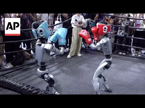 YouTube video thumbnail: Robots Fight in a Boxing Match at World Robot Conference in China