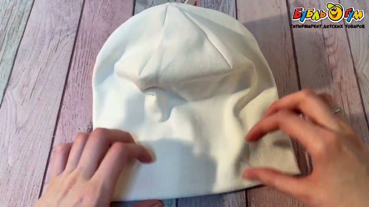 Шапочка трикотажная однотонная белая - видео