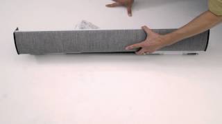 Person showing how to install wired roller serena shades