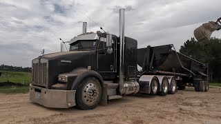 Heavy haul truck hauling broken concrete
