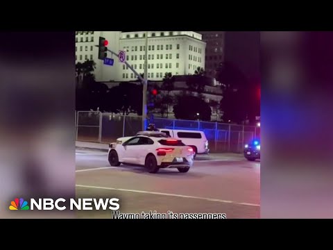 YouTube video thumbnail: Waymo Robotaxi Drives Into Active Police Scene
