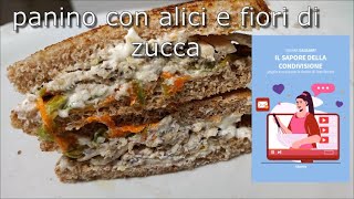 Panino goloso con alici, fiori di zucca e limone sulla piastra