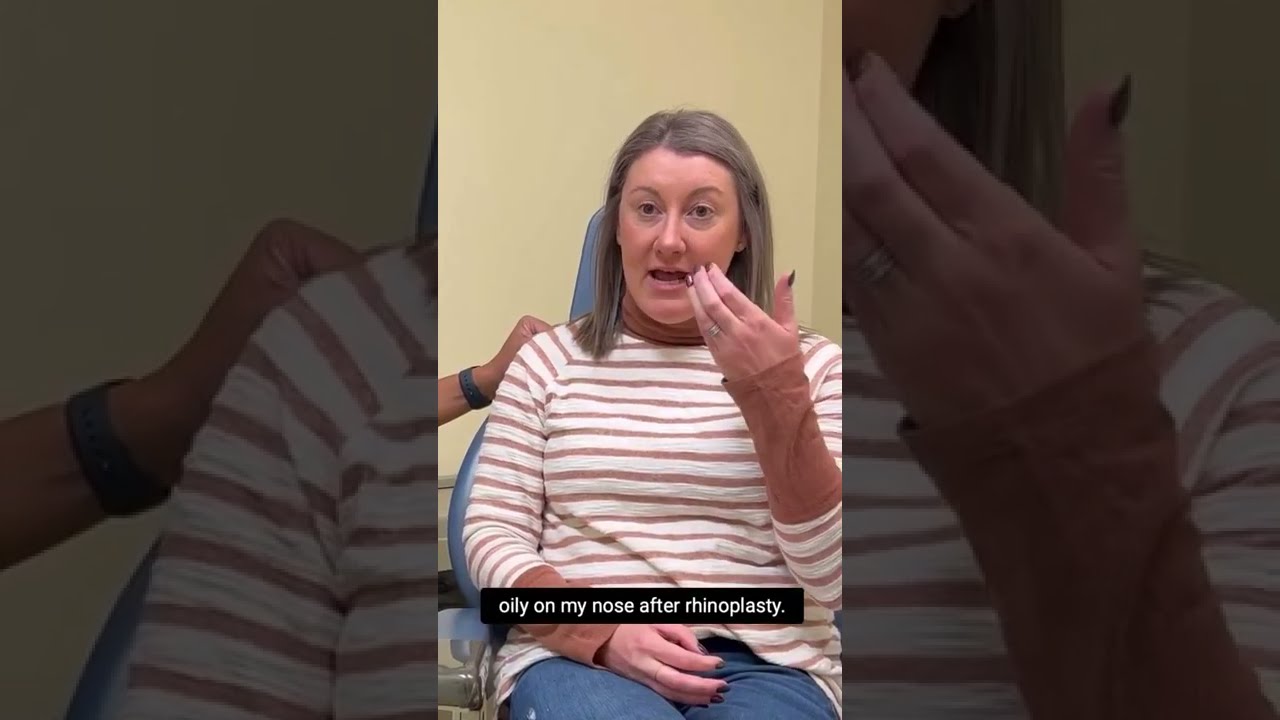 Woman discussing rhinoplasty recovery in a clinic.