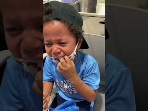 My son’s got their ears pierced ( priceless reactions) #piercing #kids #trending #viral #reaction