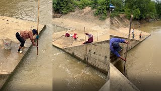 Real life fishing in river  for food  at countryside , scoop net fishing ,net fishing in river