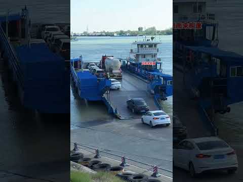 Large tank trucks line up to board the ferry to cross the river. #Ferrycrossingtheriver #Safetyfirst