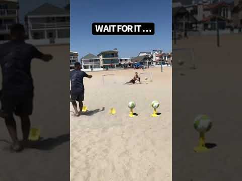 Goalkeeper training on sand