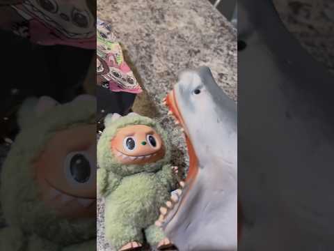 Shark Puppet opens Labubu