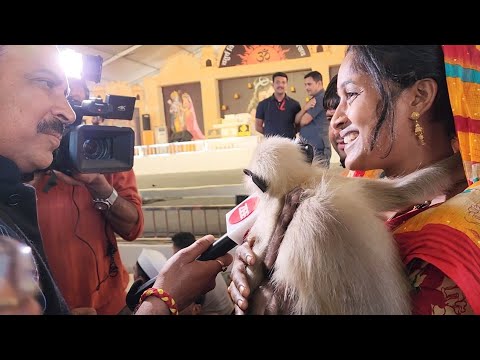 Monalisa is at Bagheswar Dham Sarkar with her adopted baby langoors and her family.