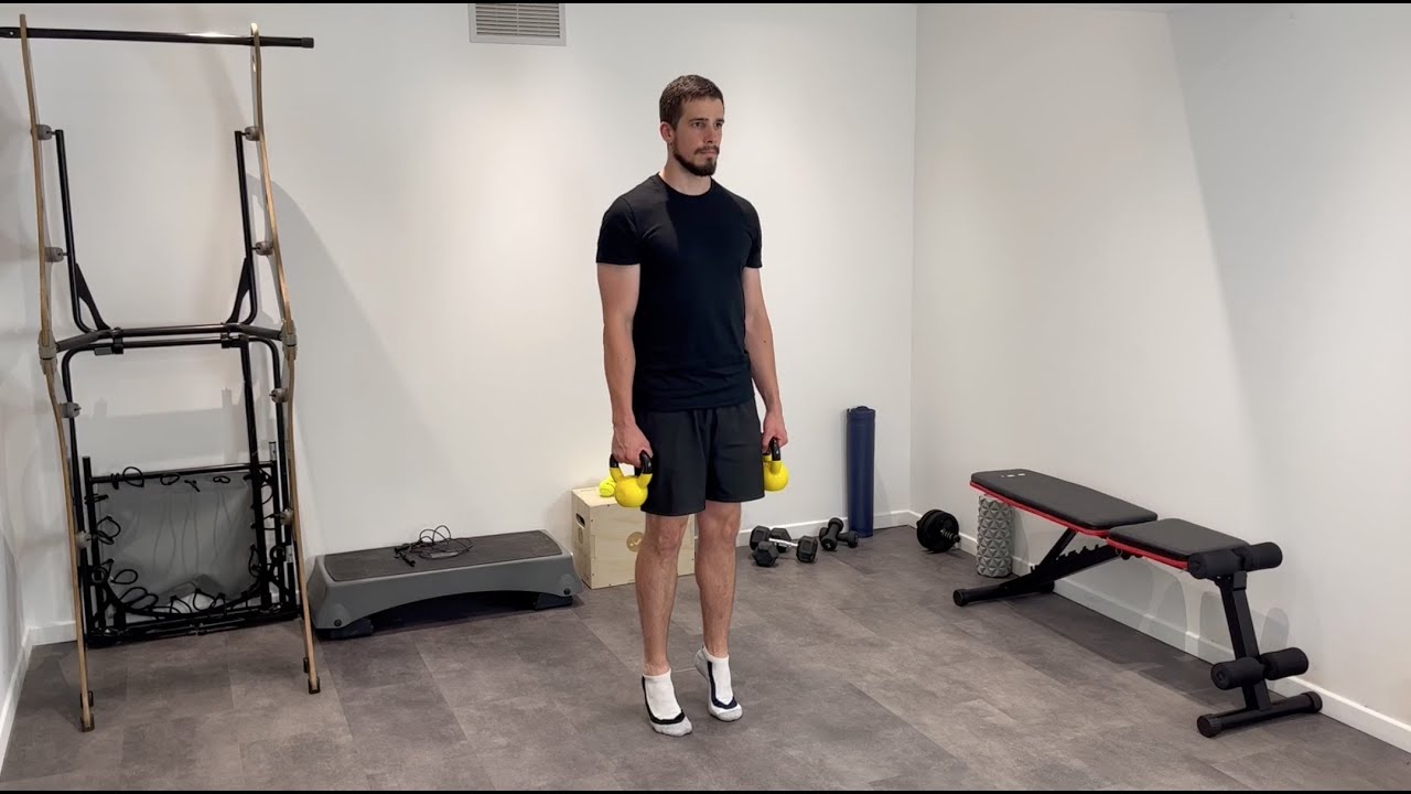 Sollevamento dei polpacci con kettlebell