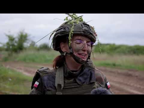 YouTube video thumbnail: 'Anything to Keep my Child Safe': Polish Mother Trains for War